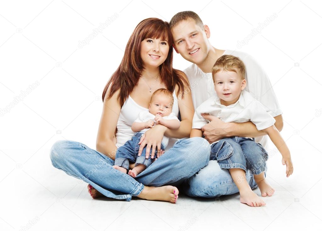 Young family four persons, smiling father mother and two children