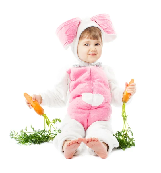 Baby in easter bunny costume with carrot, kid girl sitting rabbit hare — Stock Photo, Image