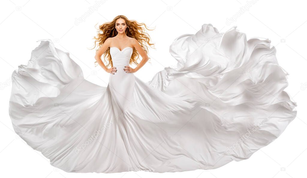 Woman White Long Dress. Red Hair Model in Wedding Gown. White Silk Fabric waving on Wind. Curly Redhead Flying Hairstyle. Isolated Background