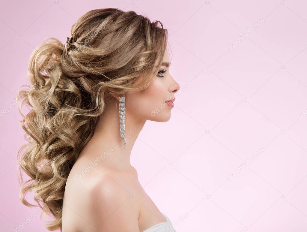 Bride Hairstyle and Make up. Woman Bridal Pinned Hair Curls. Model with Low Ponytail Evening Hairdo over Pink Background. Elegant Lady Profile with Glamour Curly Waves