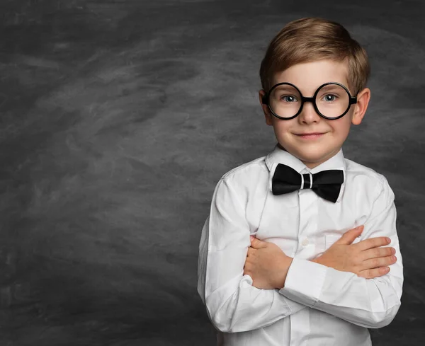 Smiling Boy Glasses Blackboard Happy Stylish Child Black Bow Tie — Zdjęcie stockowe