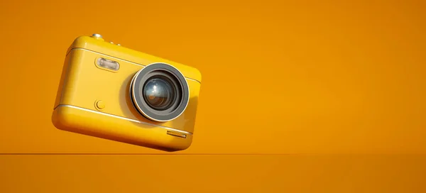 多くのコピースペースを持つオレンジの背景にオレンジのカメラの3Dレンダリング ストック画像