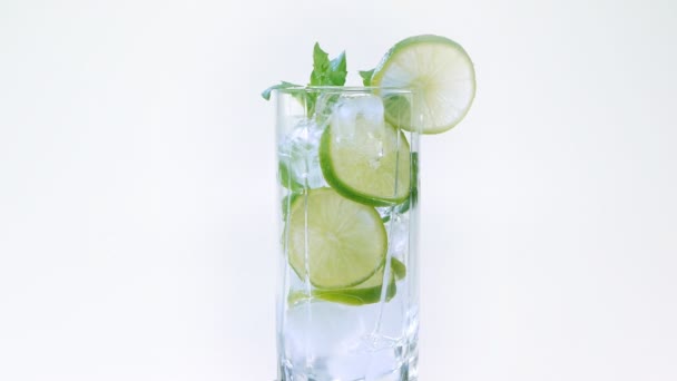 Mojito cocktail on white background — Stock Video