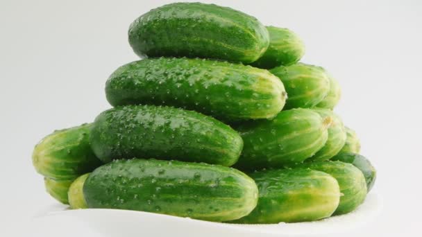 Cucumbers on a white plate — Stock Video