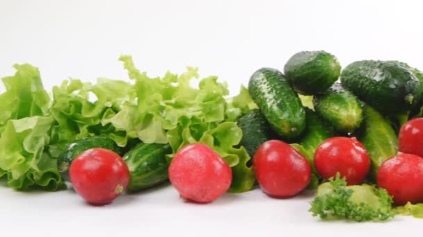 Group of vegetables for salad on a white background — Stock Video