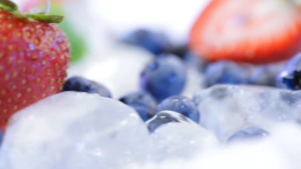 Berries and ice cubes — Stock Video