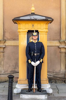 STOCKHOLM, SWEDEN - JULY 31, 2022: Guard at the royal palace in the gamla stan area of the city.