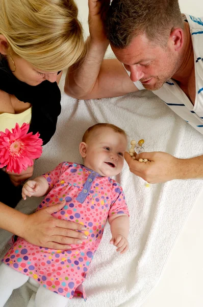 Mother father and baby playing — Stock Photo, Image