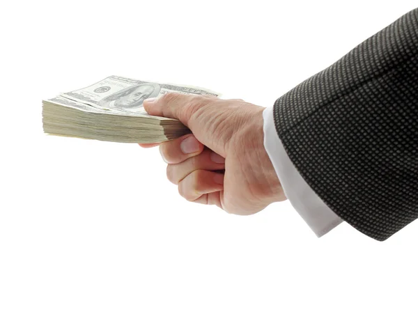 Бизнесмен держит в руках кучу долларов — стоковое фото