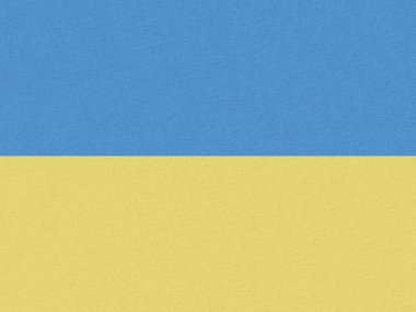 Ukrayna arkaplanıyla ayakta durun: Kağıda yazılmış Ukrayna bayrağı