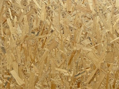 Açık kahverengi kıymık tahta dokusuna yakın.