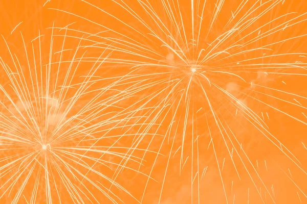 Abstracte Vakantie Achtergrond Met Geel Vuurwerk Tegen Oranje — Stockfoto