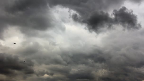Plane flight through stormy sky clouds — Stock Video