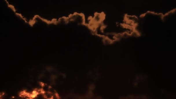 Sunrise sky through darkness clouds — Stock Video
