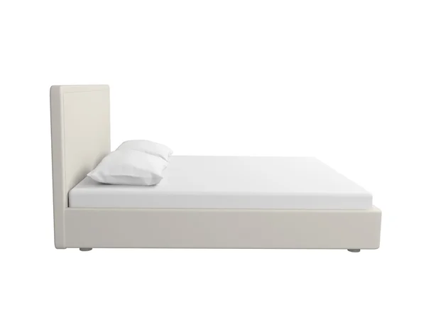 Двуспальная белая кровать . — стоковое фото