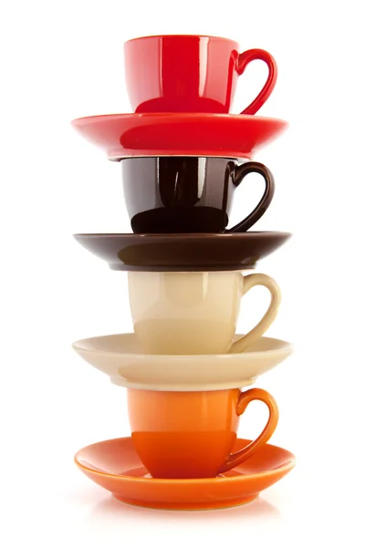 Colorful cups and saucers — Stock Photo, Image