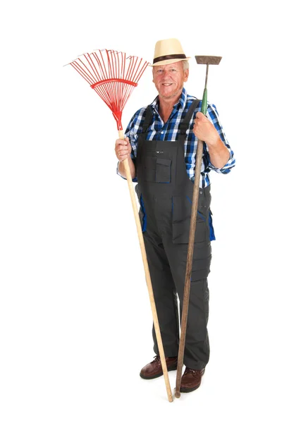 Senior gardener with equipment — Stock Photo, Image