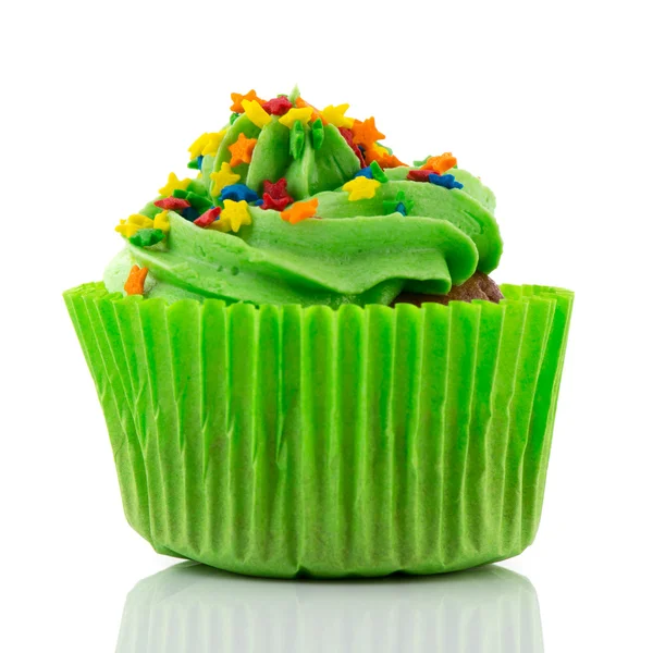 緑のカラフルな単一カップケーキ — ストック写真