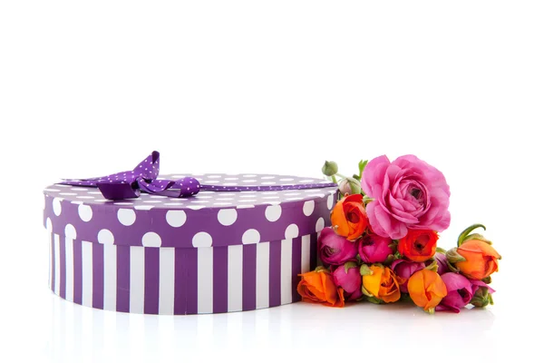 Colorful bouquet butter cups on present — Stock Photo, Image