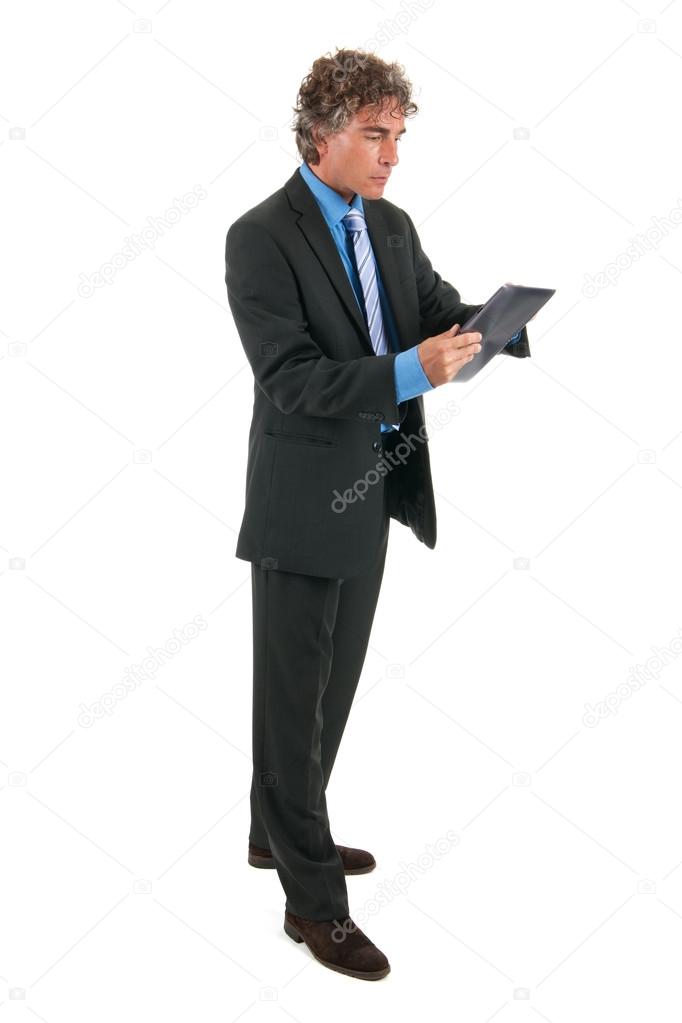 Business man with tablet in studio