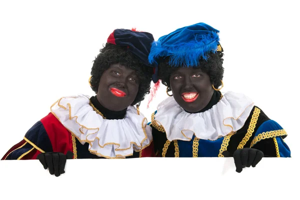Petes holandeses negros con pizarra blanca — Foto de Stock