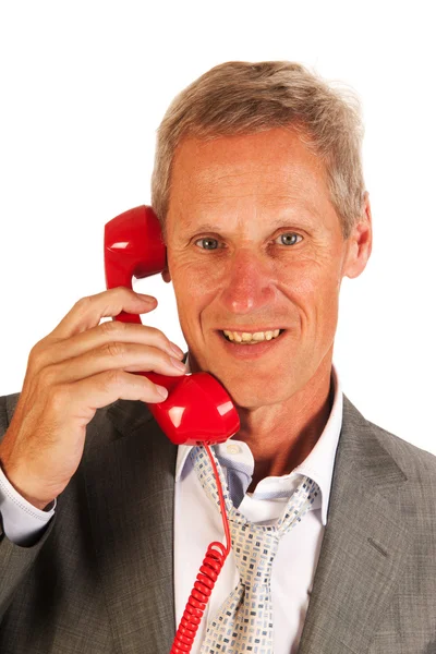 Trött affärsman på telefonen — Stockfoto