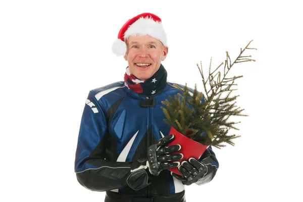 Portret motor biker met kerstboom — Stockfoto