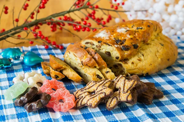 Currant bread with almond paste and other sweet food — Stock Photo, Image