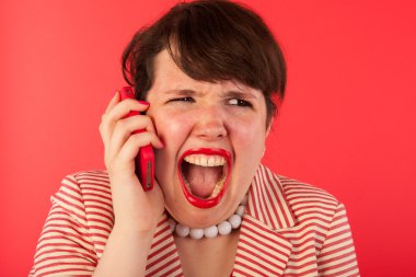 Angry phone call on the smartphone clipart