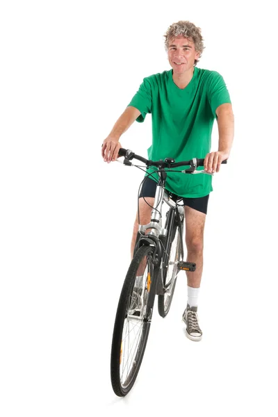 Man on bike in studio — Stock Photo, Image