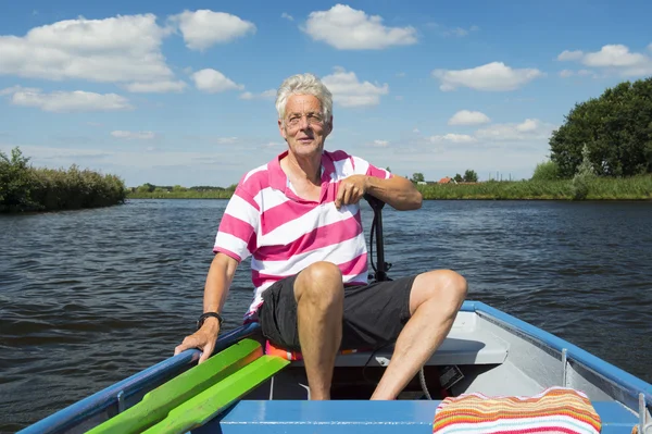 Man in boat at the river — Stock Photo, Image