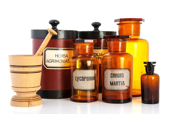 Apothecary pots with ingredients for medicins — Stock Photo, Image