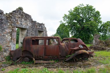 Cars of the doctor in Oradour sur Glane clipart