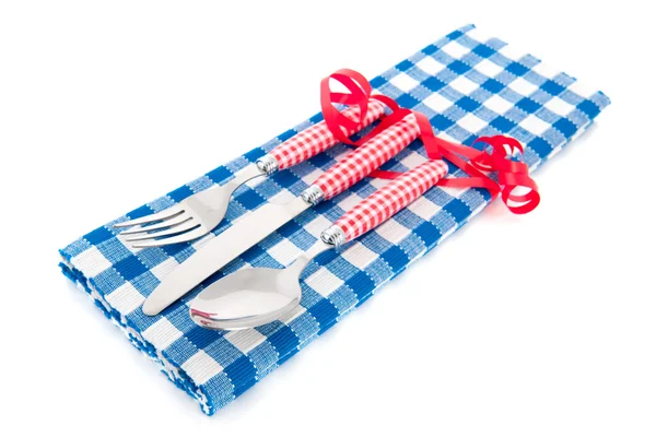 Cutlery and table cloth — Stock Photo, Image