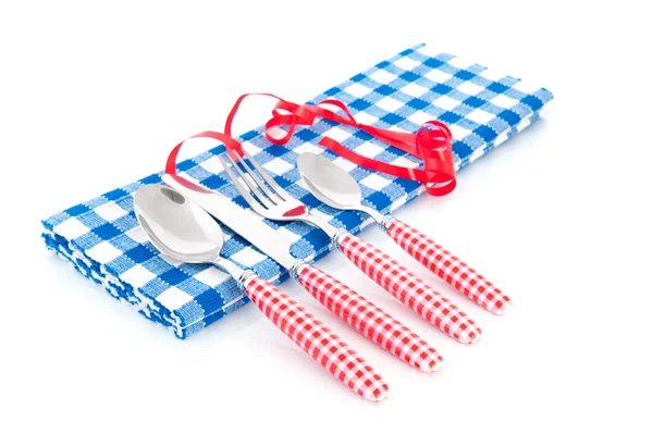 Cutlery and table cloth — Stock Photo, Image