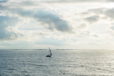 Sailboat at the sea clipart