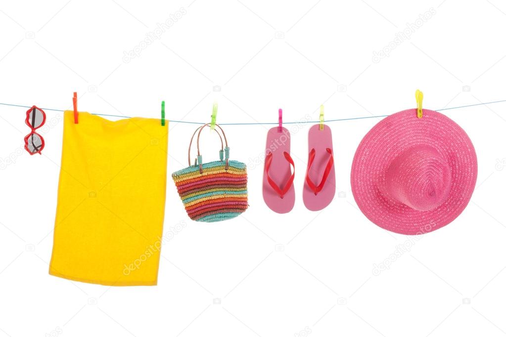 Beach laundry with towel and sunglasses