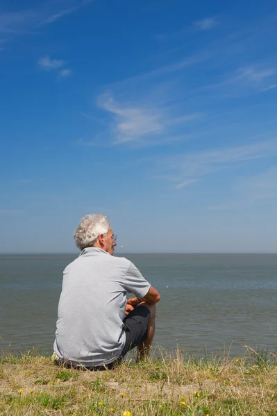 Sitting on Dutch Dyke — Stock Photo, Image