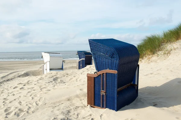 Borkum beach with blue and white chairs — Stock Photo, Image
