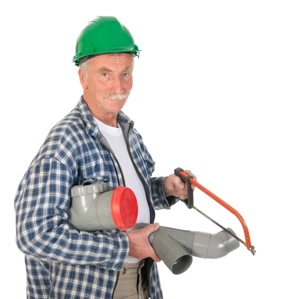 Plumber sawing PVC — Stock Photo, Image