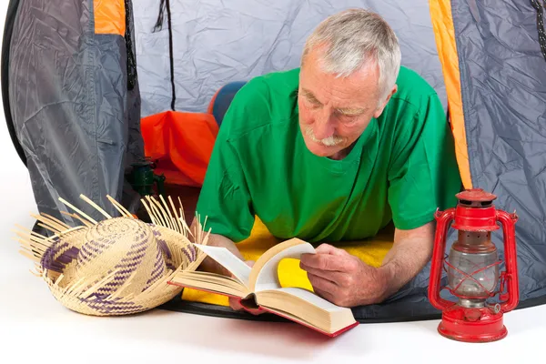 Senior man by tent — Stock Photo, Image
