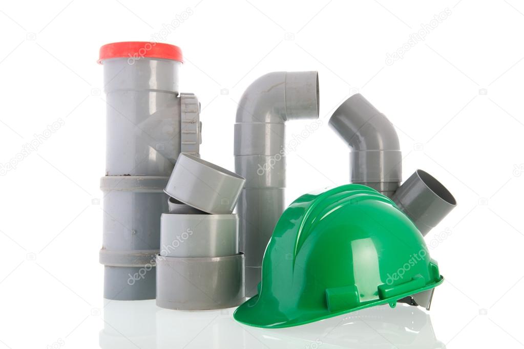 PVC pipes with green helmet