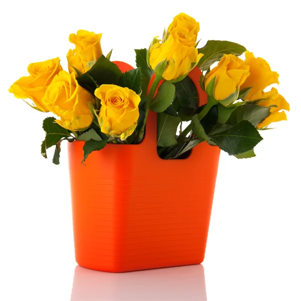 Strauß gelbe Rosen in orangefarbener Vase — Stockfoto