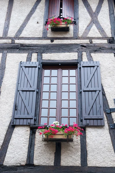 French window with plants in containers — Stock Photo, Image