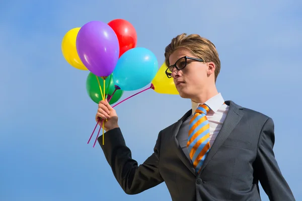 Business man with balloons — Stock Photo, Image