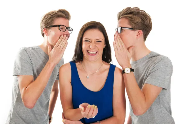 Gossip by twins with a girl — Stock Photo, Image