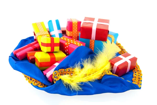 Hat of black Pete with many presents — Stock Photo, Image