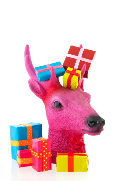 Pink Christmas reindeer with presents — Stock Photo, Image