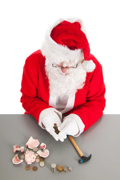 Père Noël comptant les pièces — Photo