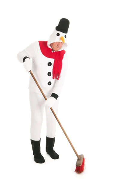 Snowman cleaning the street — Stock Photo, Image